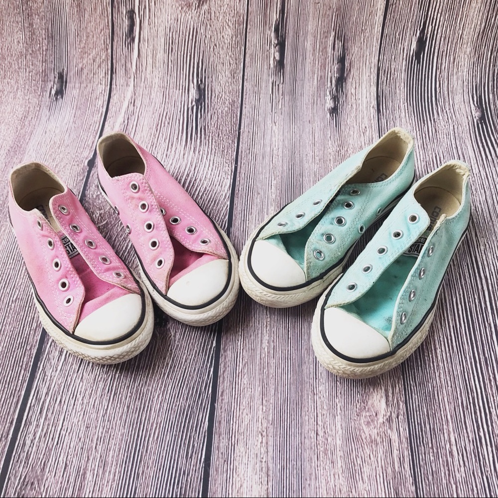 Lot of two girls converse shoes.